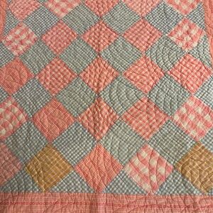 Charming Patchwork Quilt in Pink and Blue